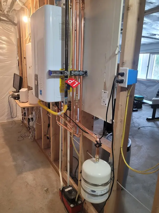 Licensed plumber repairing a kitchen sink in Dothan