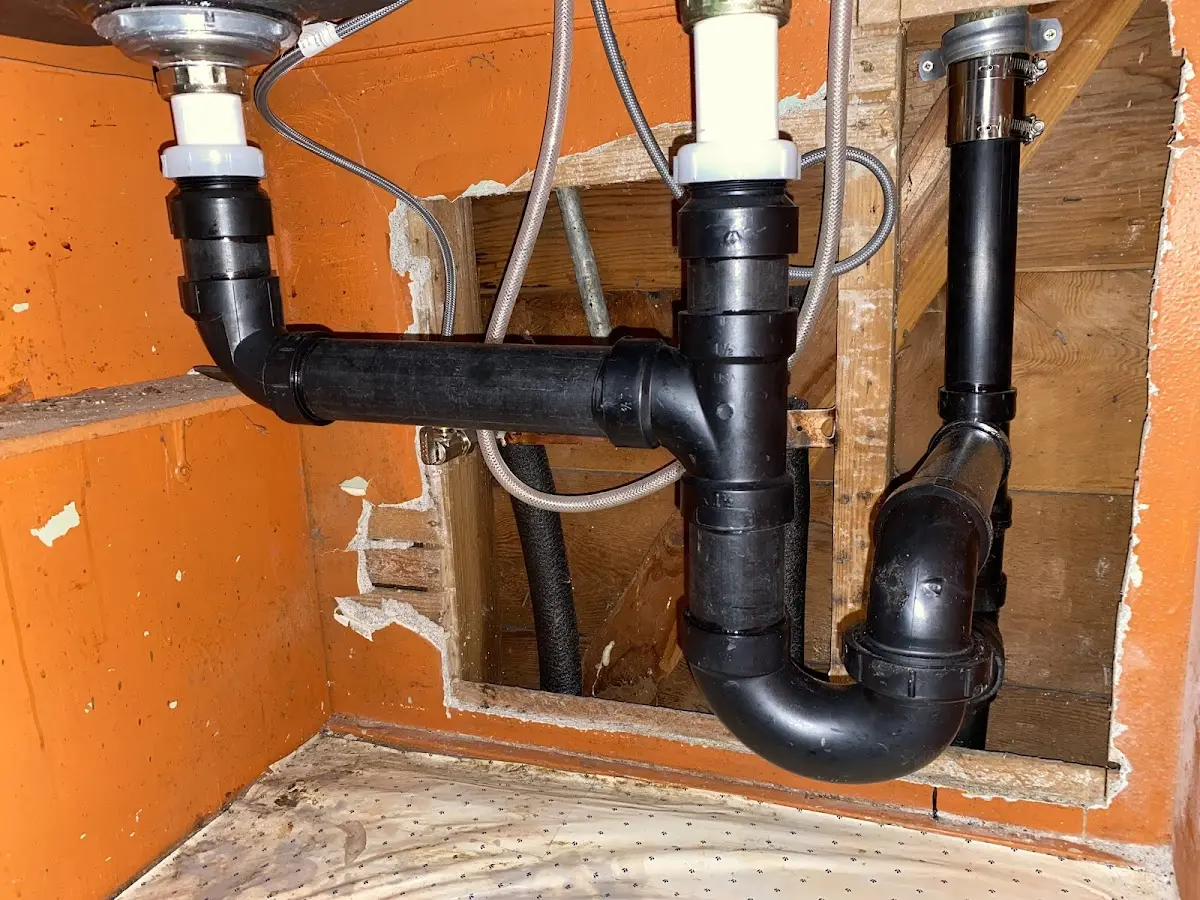 Professional Garbage Disposal Repair equipment and tools on the job in Dothan